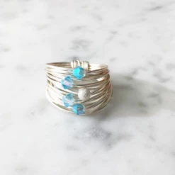 A Blonde and Her Bag women Marcia Ring with Aquamarine AB Crystals